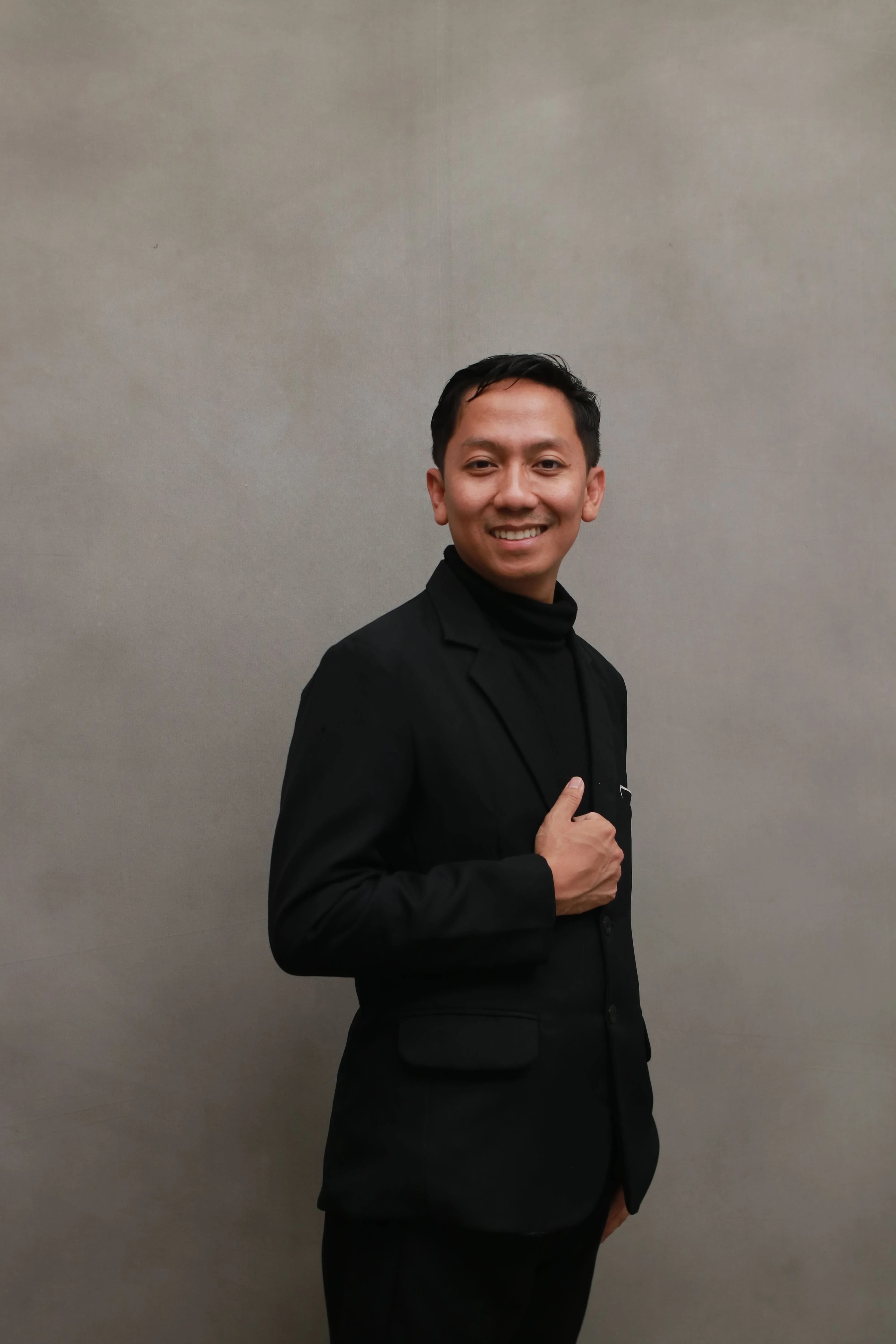 Mas Ridwan portrait — suit